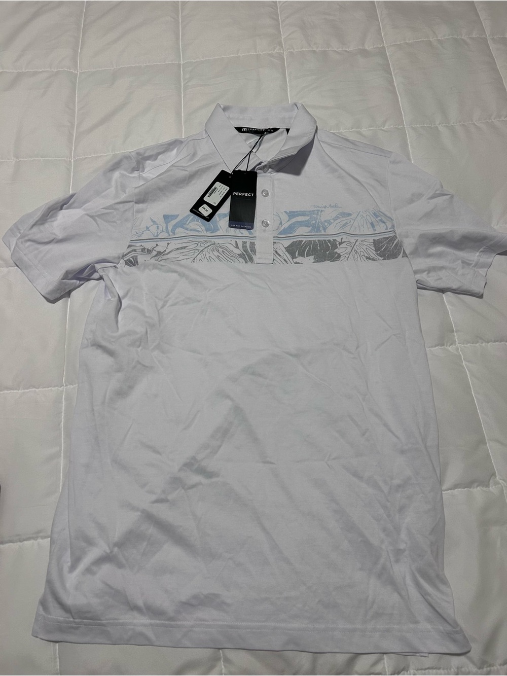 TravisMathew White Polo with Light Blue & Gray Chest Stripe